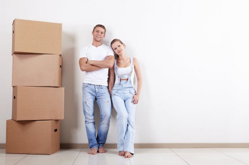 Removal team planning a flat move in Waterloo near apartment buildings
