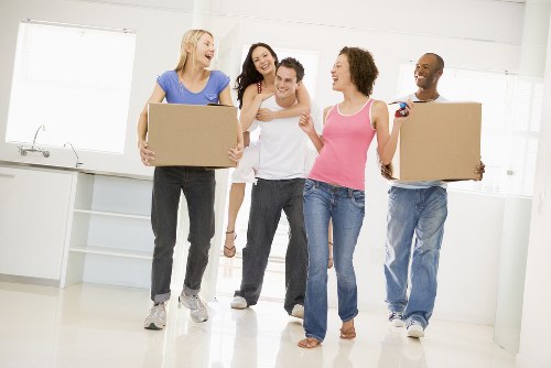 Careful loading of household items during a Waterloo flat relocation