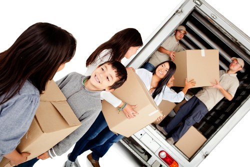 Removal van ready for a local move in Waterloo near busy streets and apartment buildings