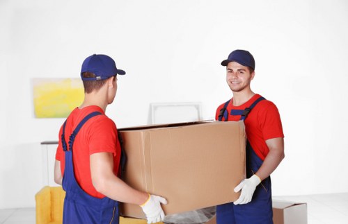 Furniture removals team loading large household items in Waterloo