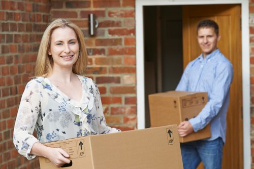 Removalists loading household furniture for a Waterloo move