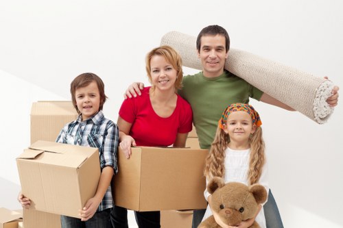 Packed boxes and furniture ready for apartment removals in Waterloo