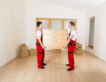 Packed boxes and furniture prepared for a removal van service in Waterloo